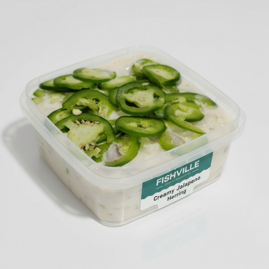Container of Fishville Creamy Jalapeno Herring with sliced jalapenos