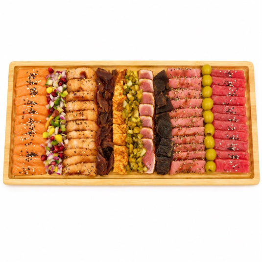 Assorted luxury cured fish platter with smoked salmon, tuna, and mackerel on a stylish serving tray, by Fishville.